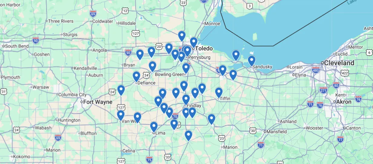 A Map Of Northwest Ohio And Surrounding Areas Displays Multiple Blue Location Markers In Cities Such As Toledo, Bowling Green, Lima, And Sandusky.