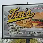 Restaurant Sign For “Tim’s” Advertising Wings, Cheeseburgers, Catering, Drive Thru, With An Image Of A Burger And Fries. Address Shown As 445 Ohio Ave.